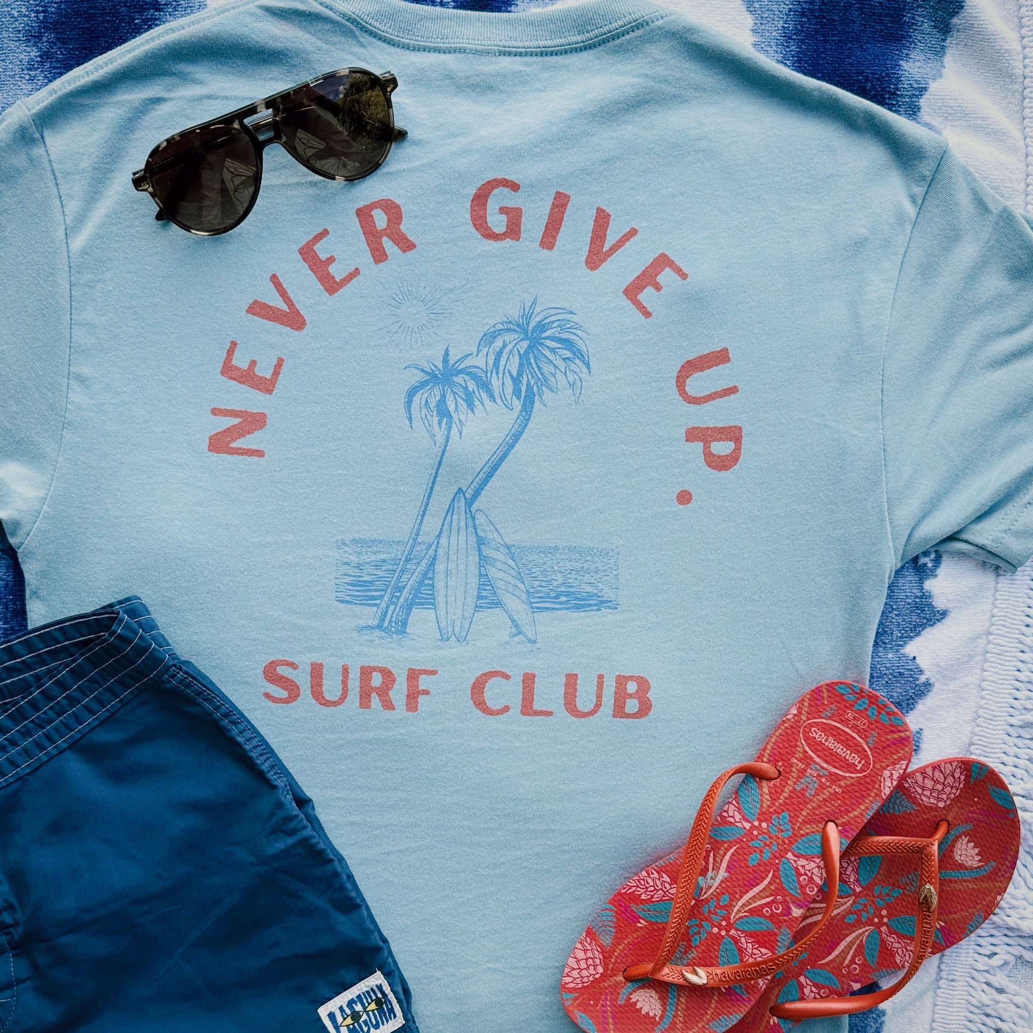 NEVER GIVE UP. SURF CLUB
