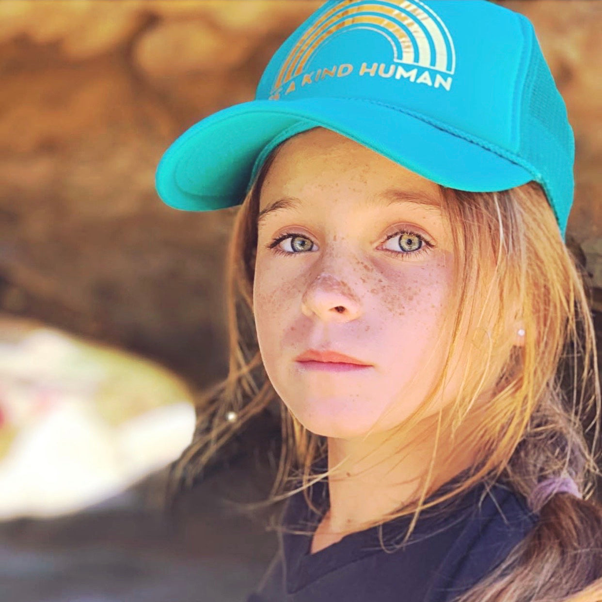 BE A KIND HUMAN TRUCKER HAT