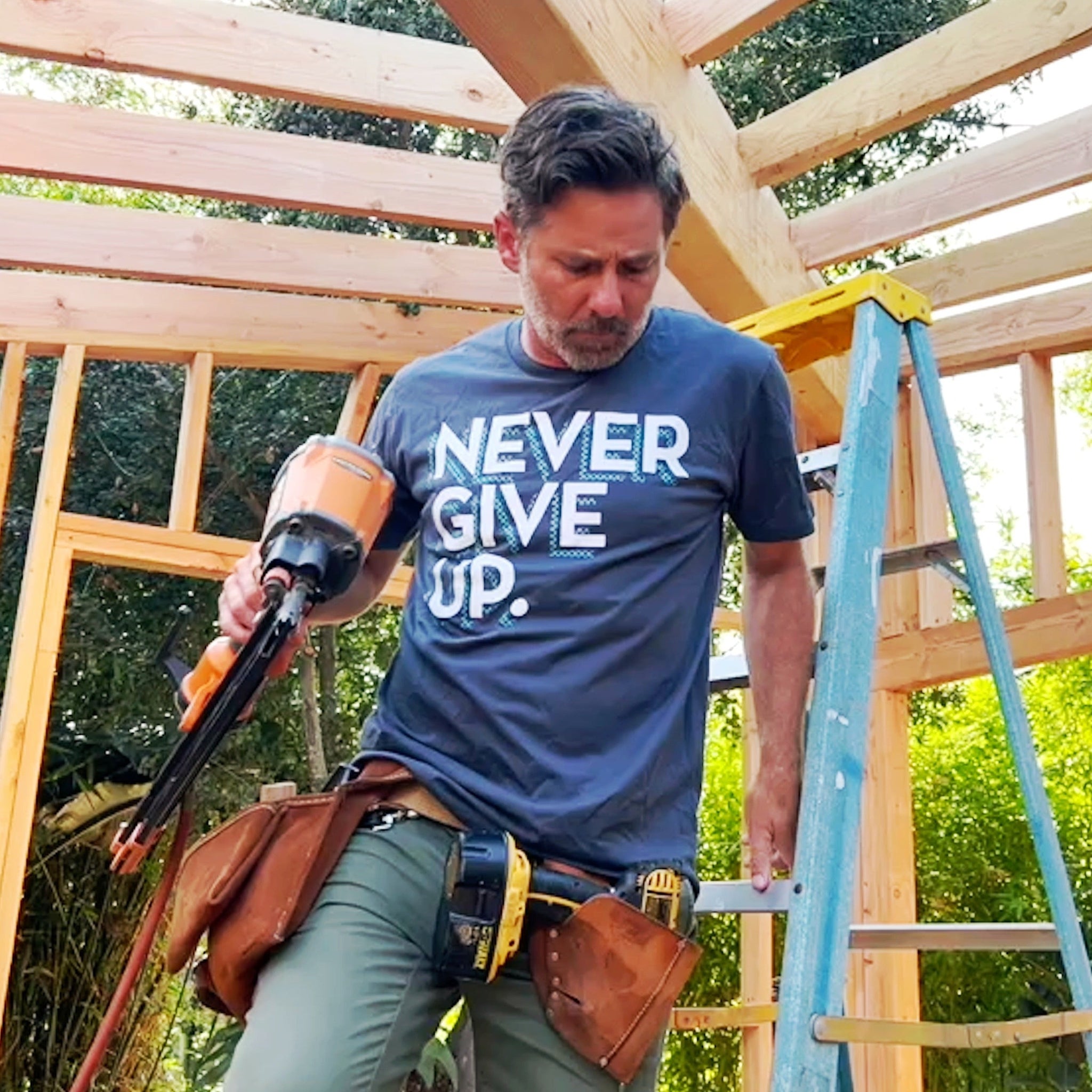 CHECKERBOARD NEVER GIVE UP. TEE