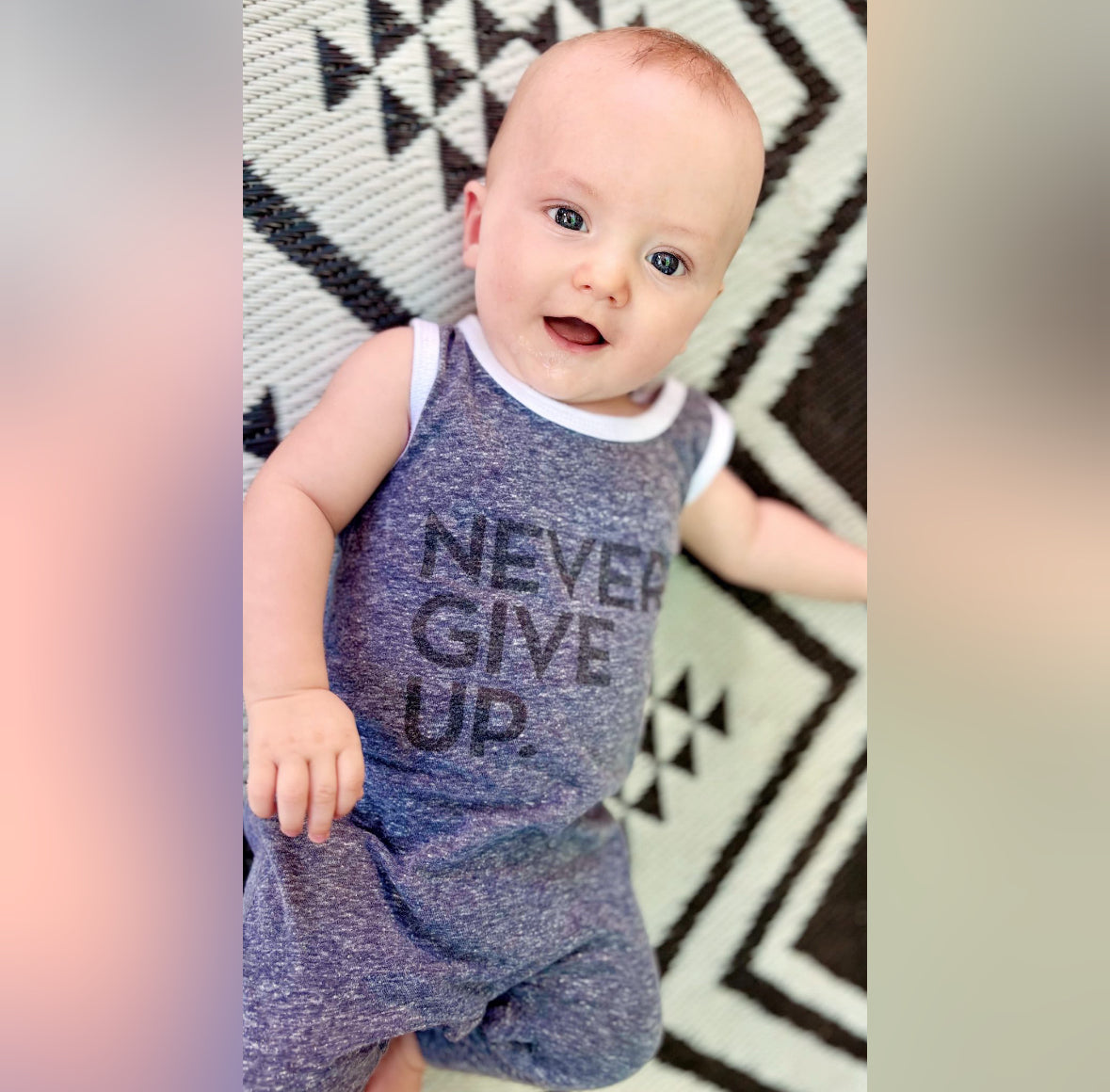 NEVER GIVE UP. ROMPER