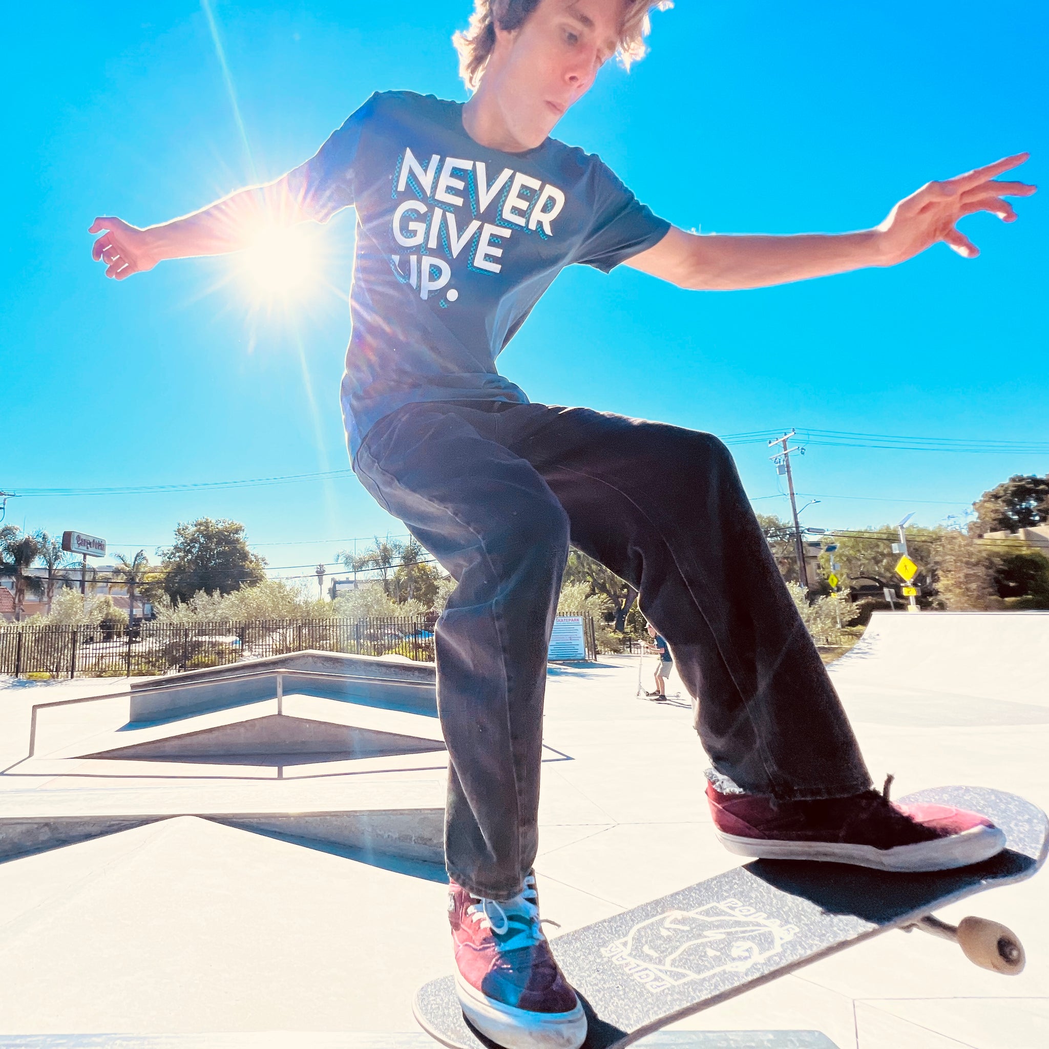 CHECKERBOARD NEVER GIVE UP. TEE