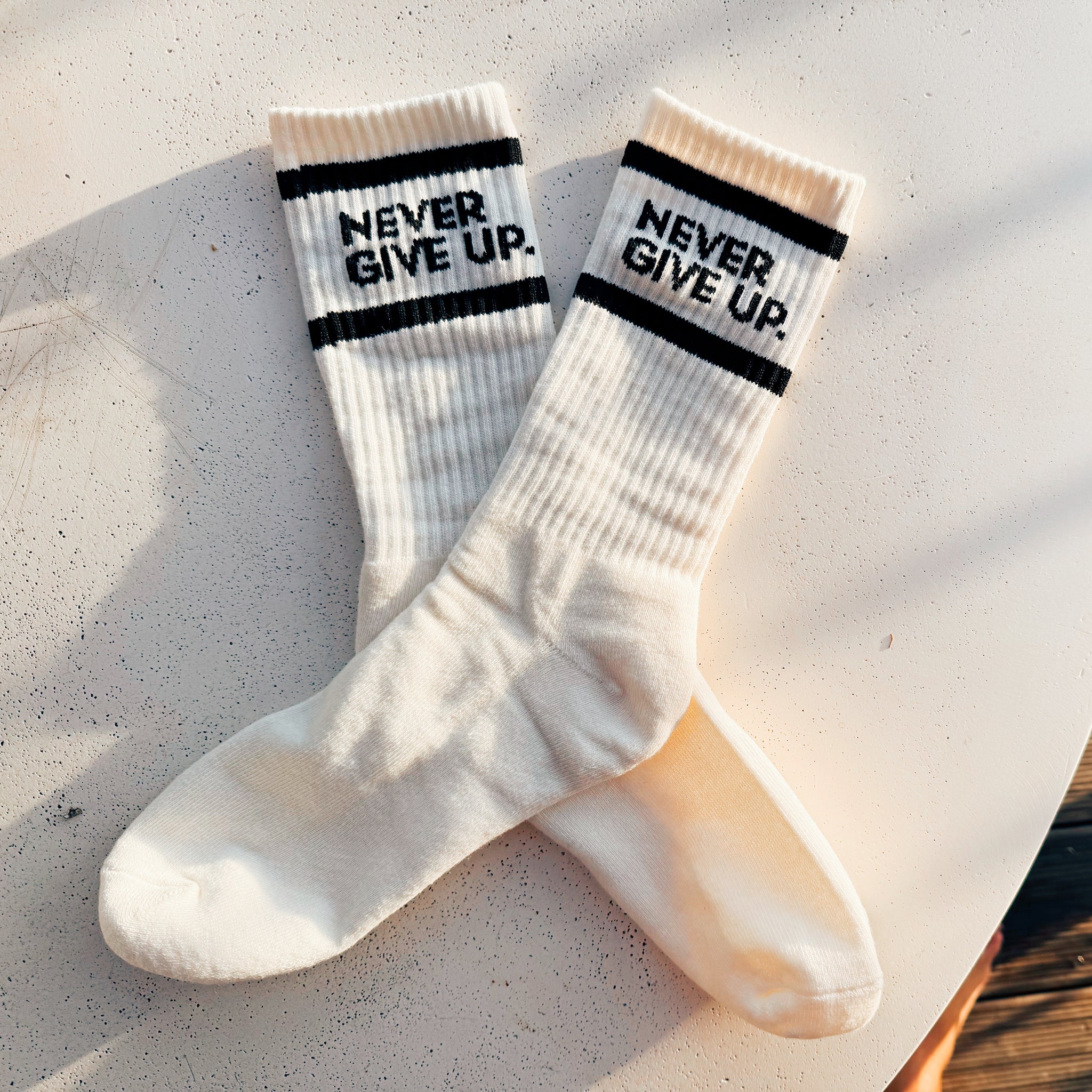 NEVER GIVE UP. STRIPED CREW SOCKS