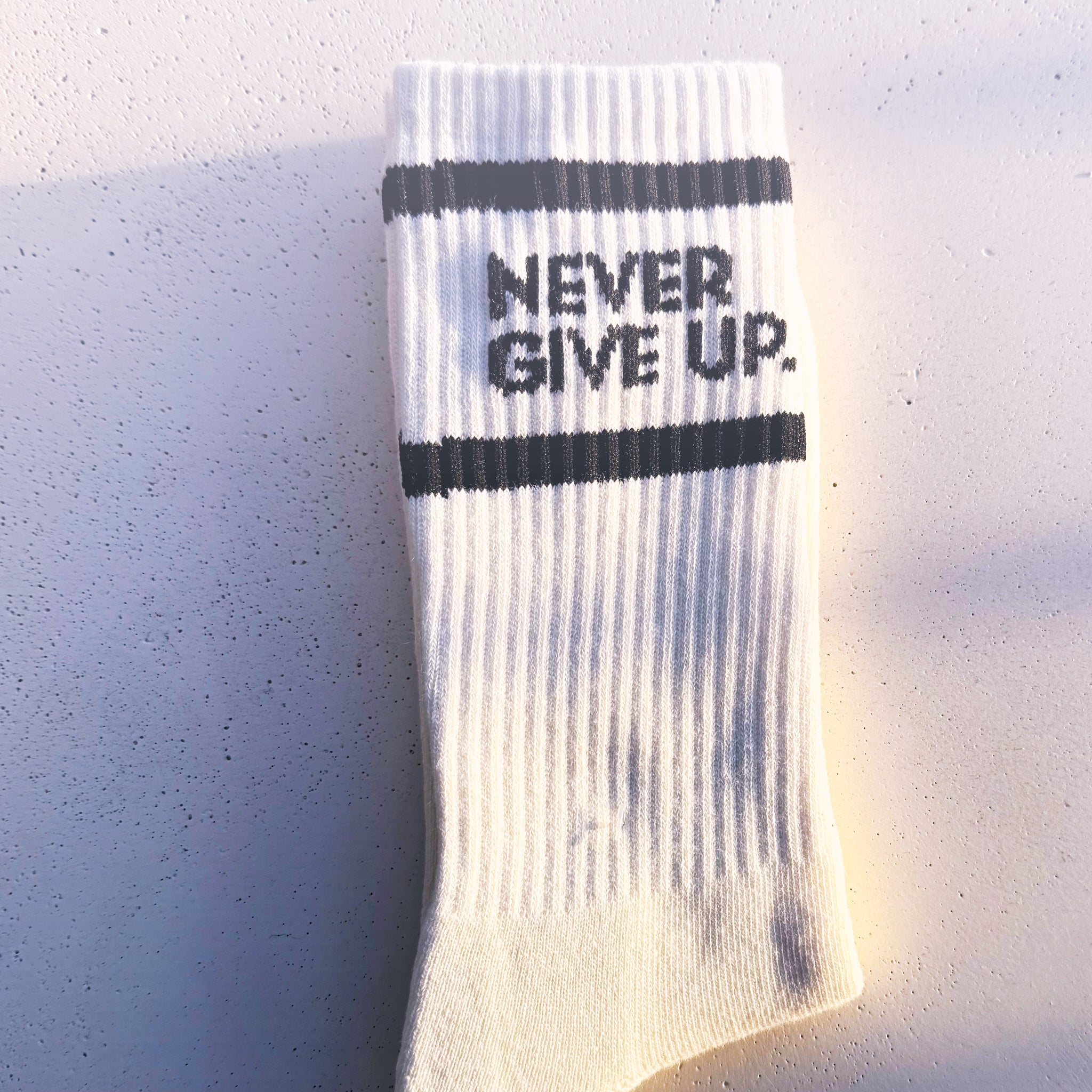 NEVER GIVE UP. STRIPED CREW SOCKS