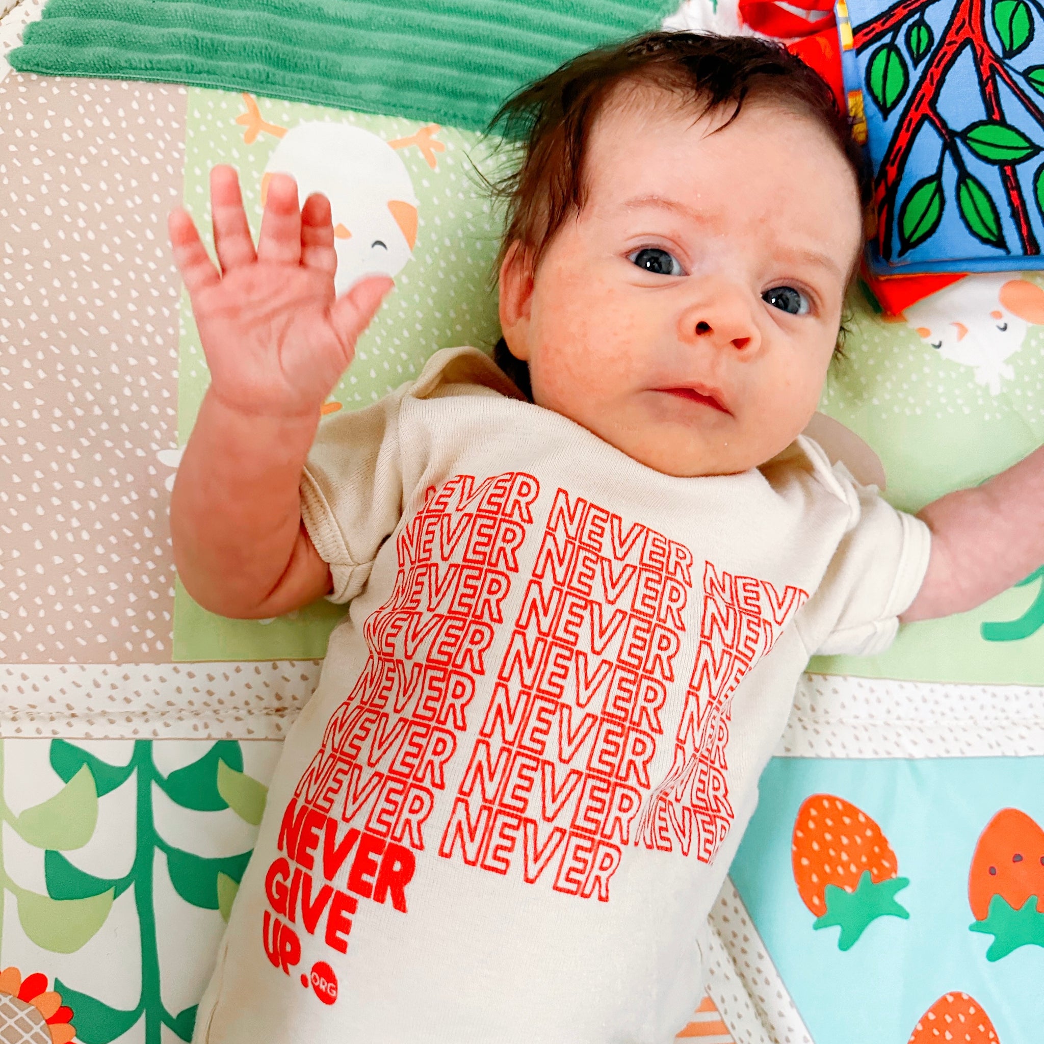 BABY INFINITE NEVER GIVE UP. ONESIE