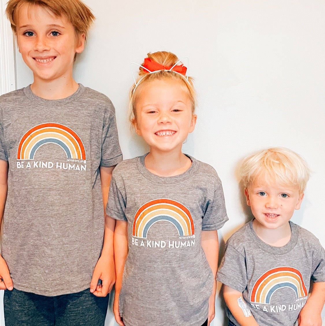 BE A KIND HUMAN (RAINBOW) TEE