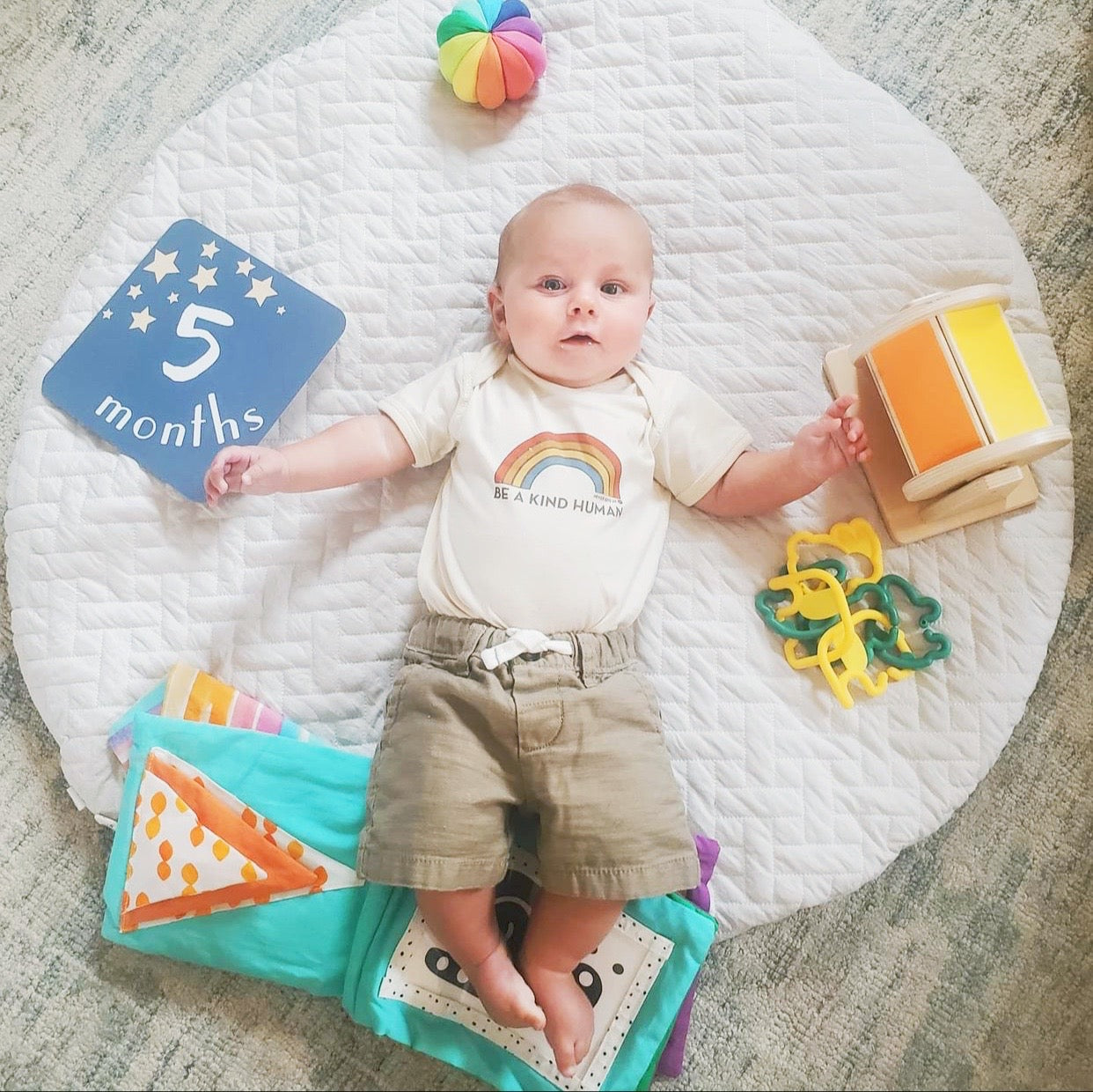 BE A KIND HUMAN ORGANIC ONESIE