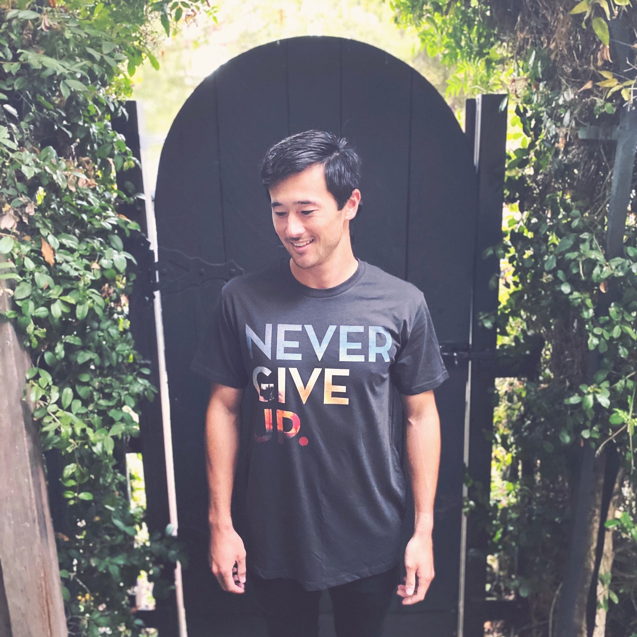 SUNSET NEVER GIVE UP. TEE