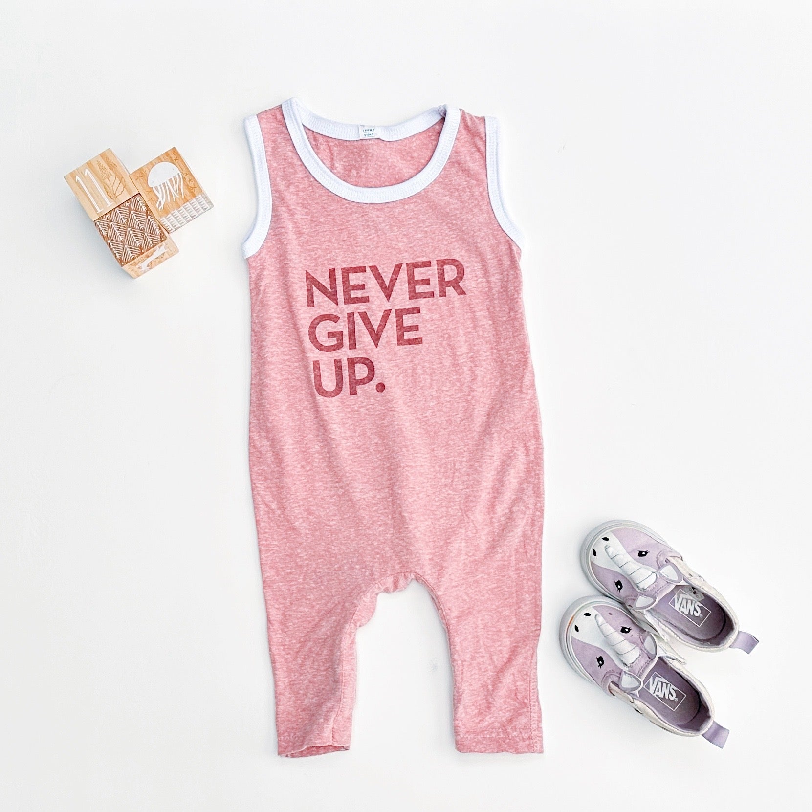 NEVER GIVE UP. ROMPER
