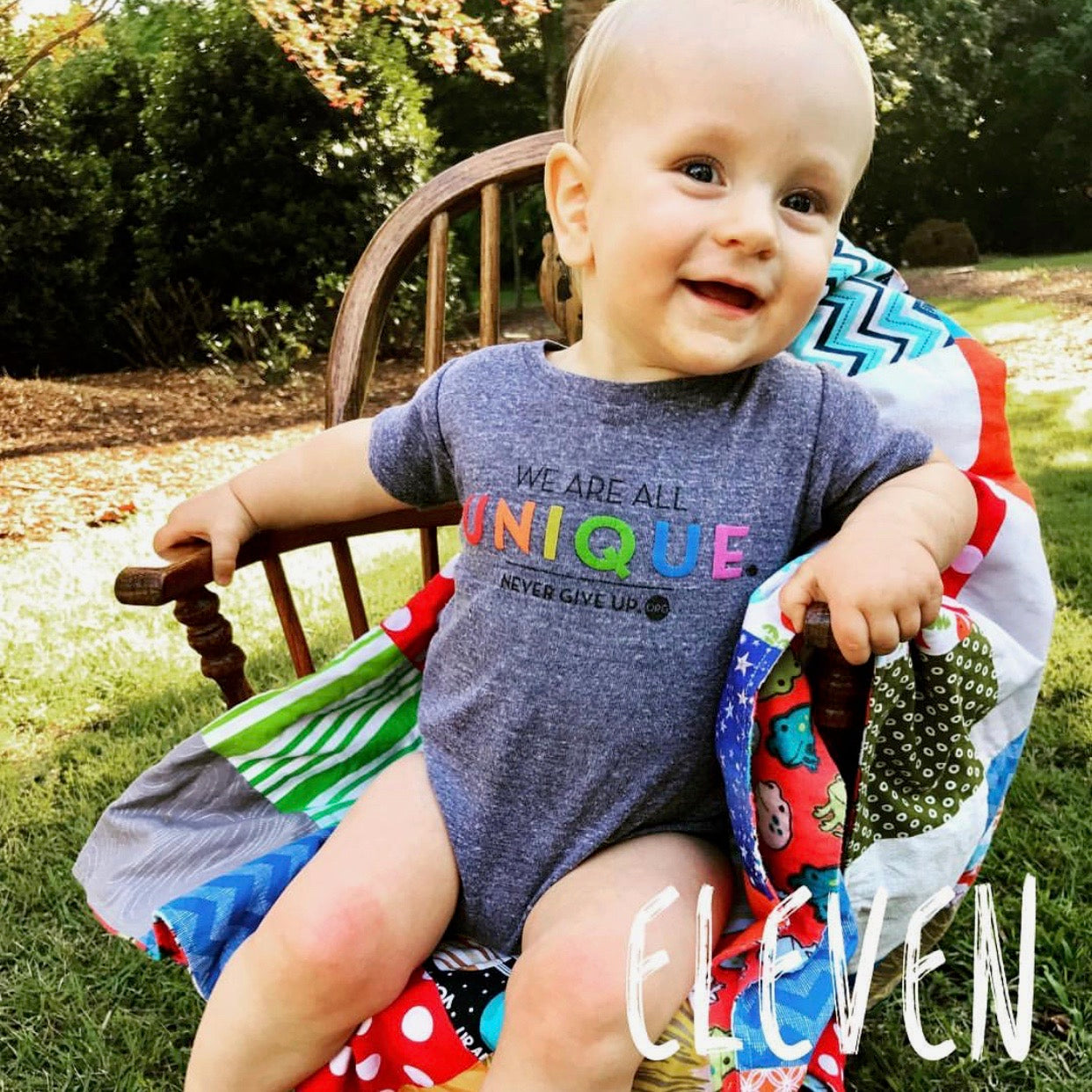 BABY WE ARE ALL UNIQUE ONESIE