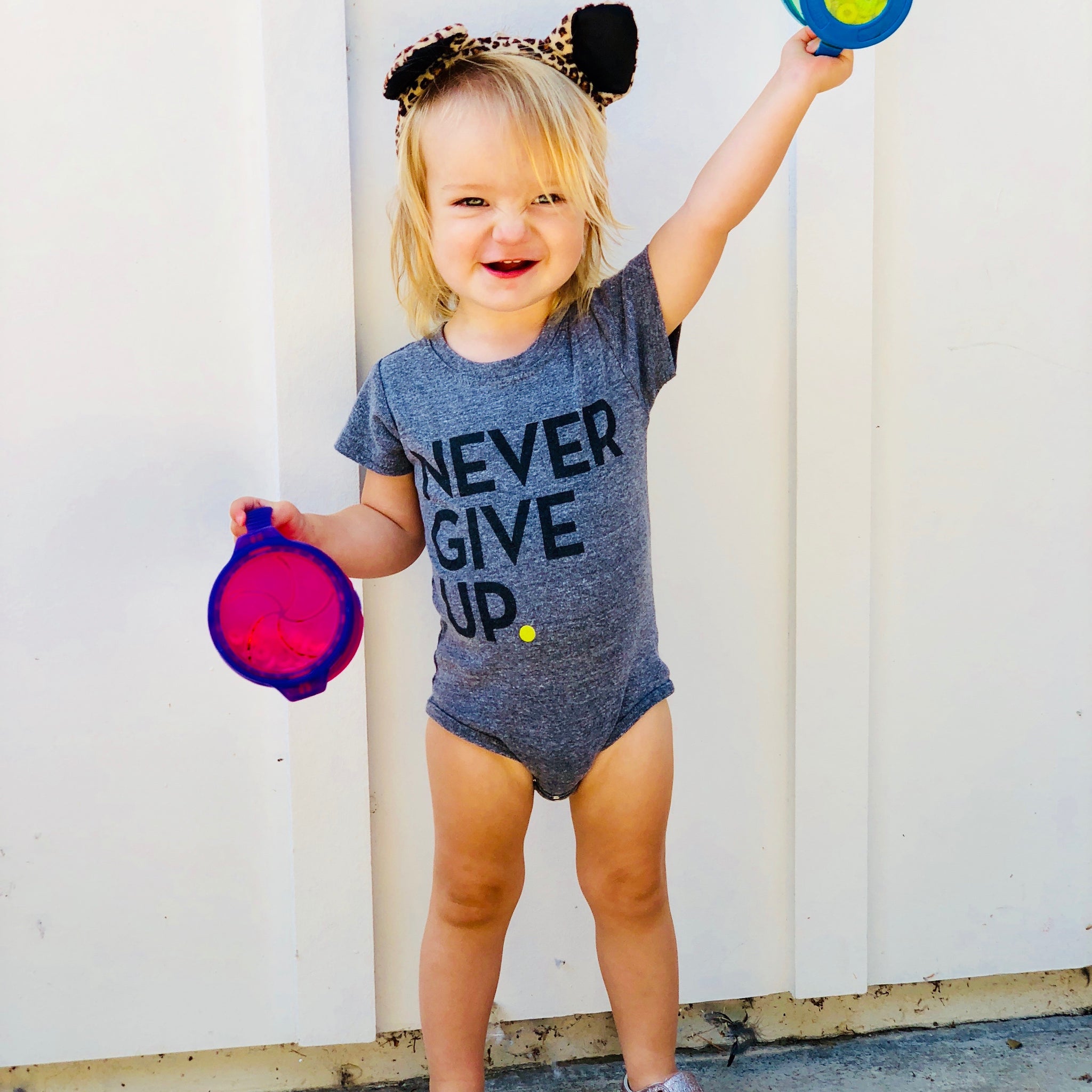 BABY NEVER GIVE UP. ONESIE