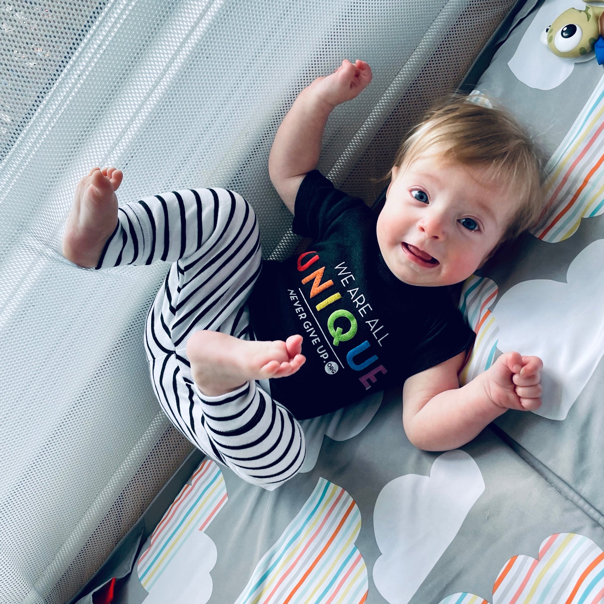 BABY WE ARE ALL UNIQUE ONESIE