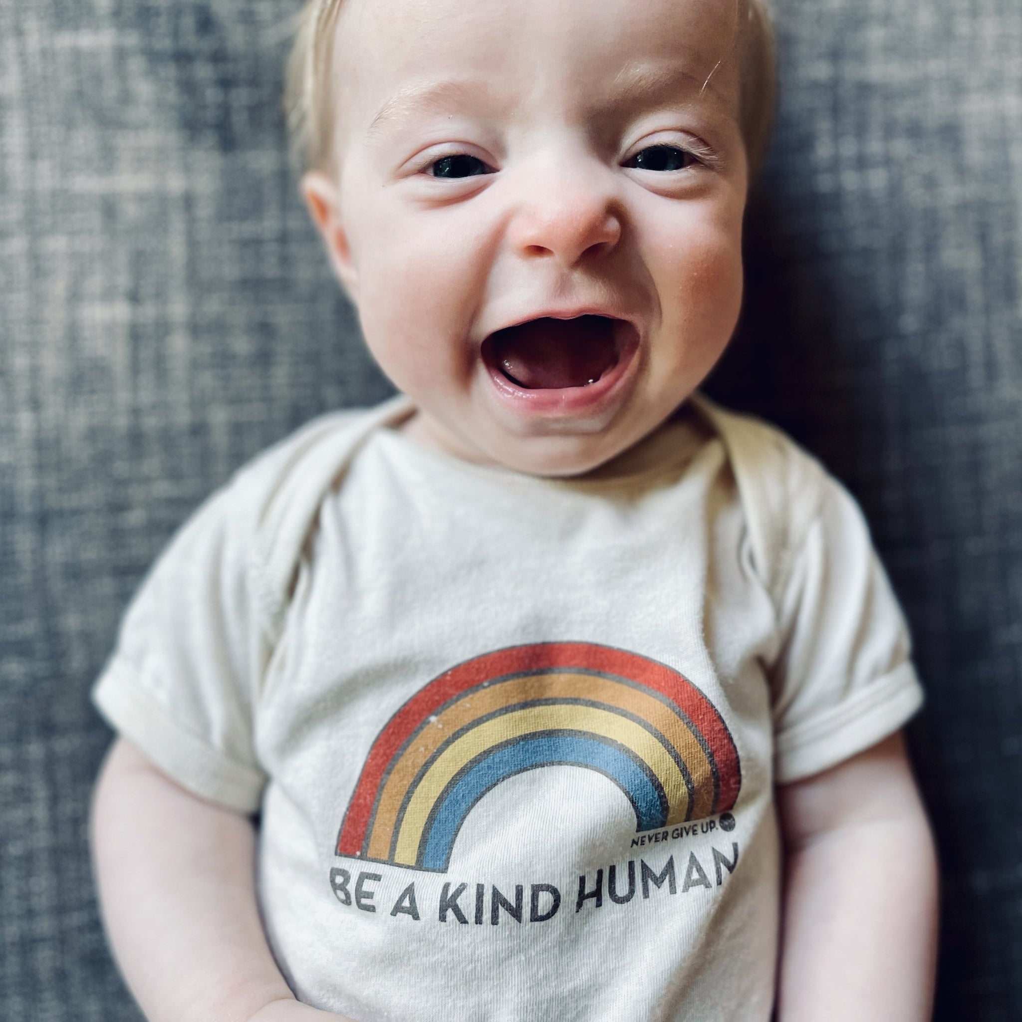 BE A KIND HUMAN ORGANIC ONESIE