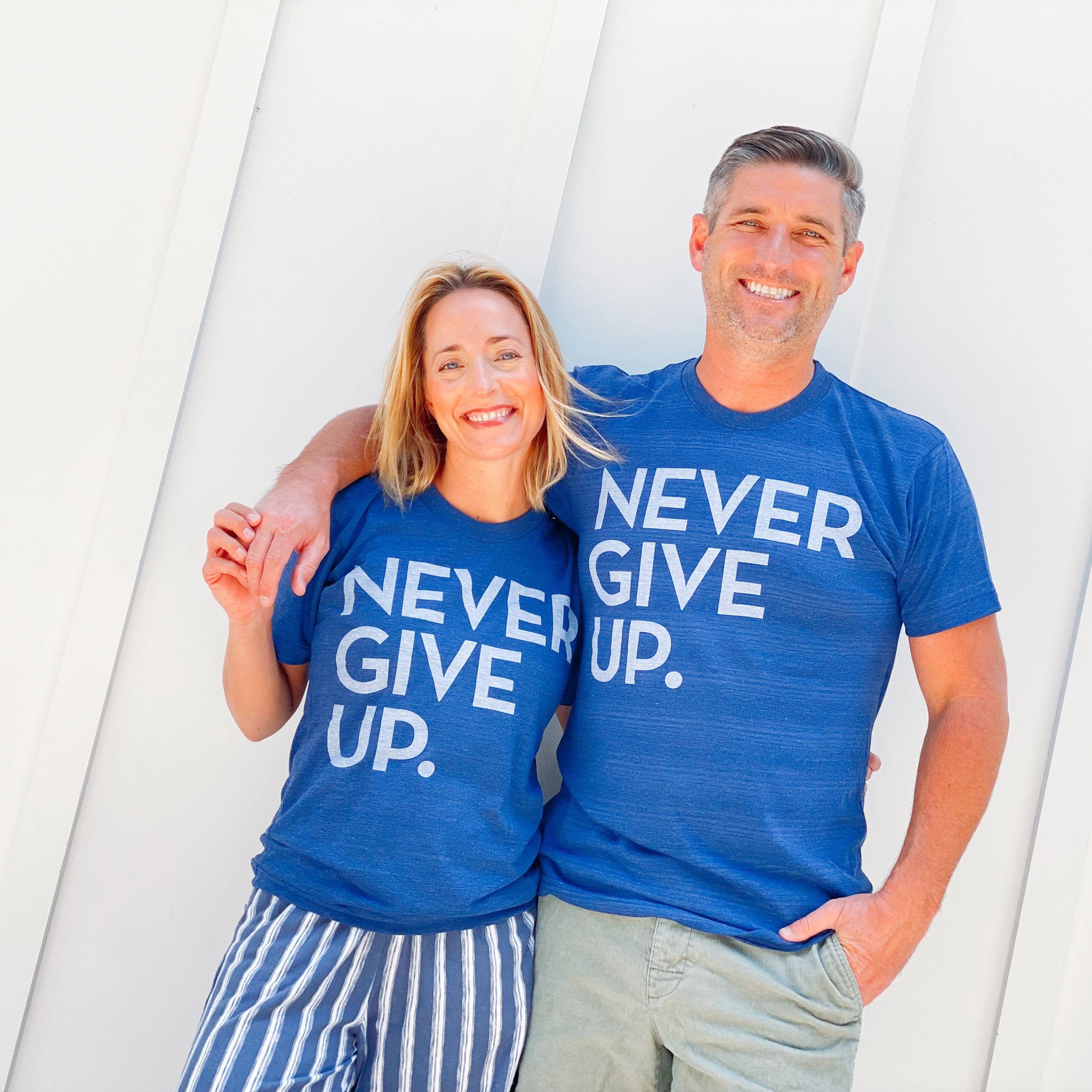 ROYAL BLUE SIGNATURE NEVER GIVE UP. TEE