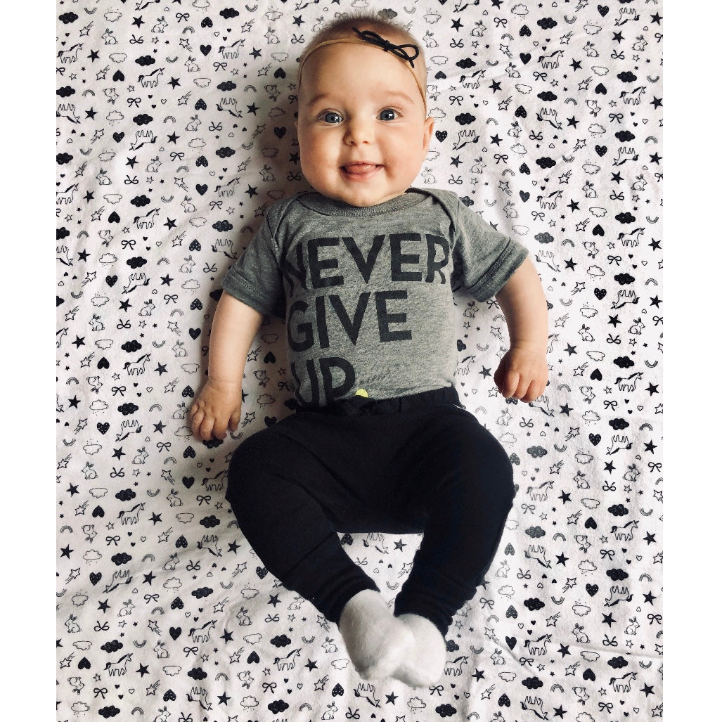 BABY NEVER GIVE UP. ONESIE