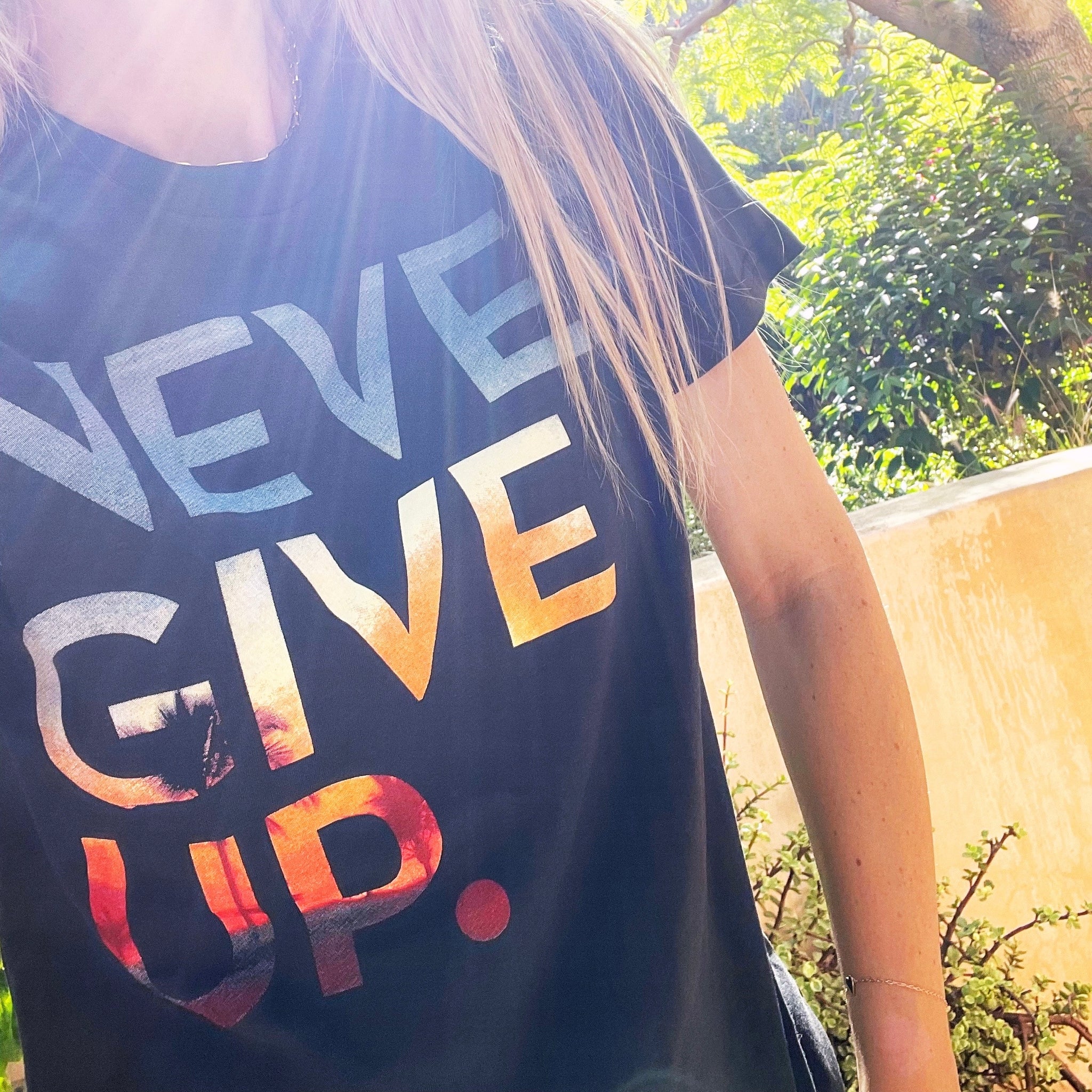 SUNSET NEVER GIVE UP. TEE